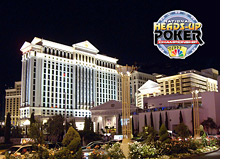 -- Night shot of Caesars Hotel in Las Vegas with the Heads-Up Poker logo imposed over --