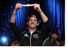 -- joe cada holding up the wsop 2009 bracelet - main event winner - world series of poker --