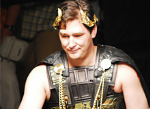 -- Phil Hellmuth - The Brat - Wearing the Ceasar costume at the table --
