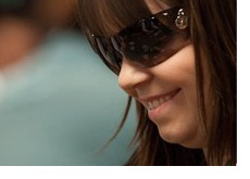 Annette Obrestad at the poker table - smiling