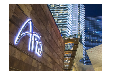 HOtel Aria - Pink neon sign near the entrance.