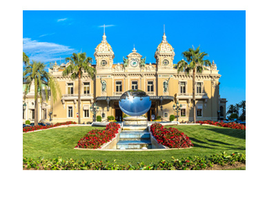 Casino Monte Carlo - Main entrance - Beautiful sunny day - Globe art feature in front.