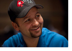 Daniel Negreanu smiling in a blue shirt