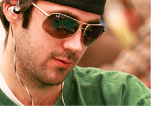 Jason Mercier in a green shirt wearing Ray Ban shades