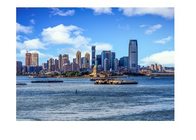 The New Jersey skyline with Statue of Liberty in the foreground. Very nice photo taken on a very nice day.