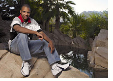 phil ivey - poker player - photographed at his home - garden