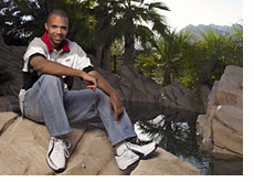 phil ivey - poker player - photographed at his  home - garden