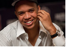 Phil Ivey in a fancy shirt wearing a big watch yo