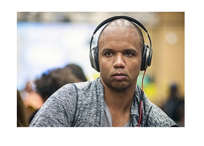 Phil Ivey - 2016 shot - headphones, gray shirt, open neck