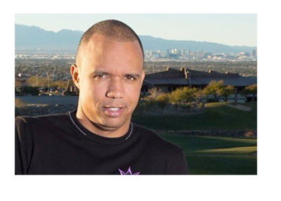 Phil Ivey posing in front of the Las Vegas skyline. Instagram photo.