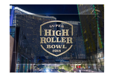 The Super High Roller Bowl 2018 at the Aria Casino in Las Vegas.  Night shot of the hotel exterior with tournament logo.