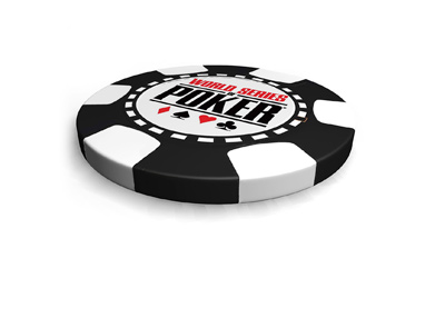 Isolated on white background lies the World Series of Poker black and white chip. Facing up.
