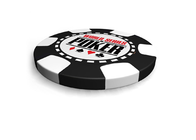 Isolated on white background lies the World Series of Poker black and white chip.  Facing up.