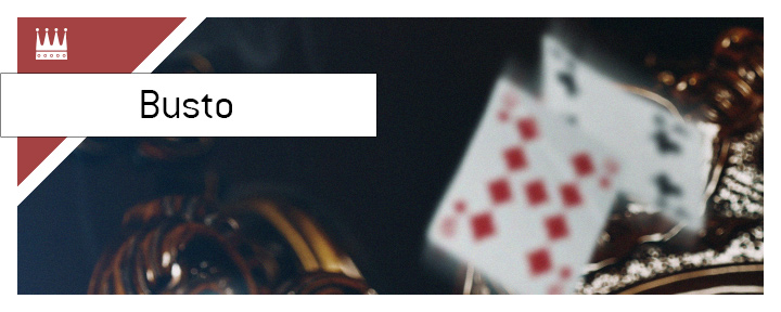 In photo: Cards flying around after a Busto. What is the meaning of the term?