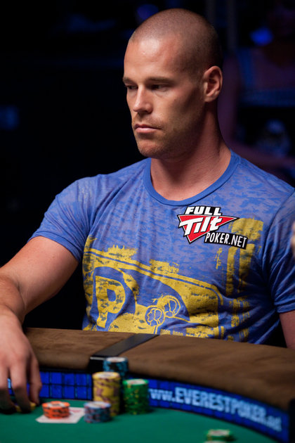 Poker Face - Patrik with an emotionless stare at the WSOP 2010 - Wearing a blue t-shirt and a Full Tilt Poker logo