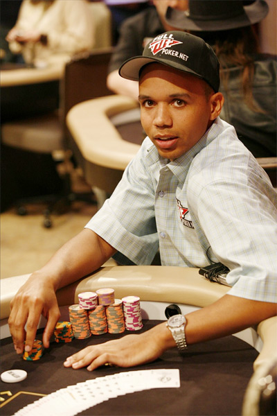 Phil Ivey posing at the table with a stack of chips in front